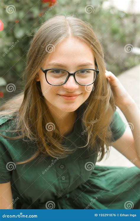 blonde hair girl with glasses|Blonde teen girl and glasses Stock Photos and Images